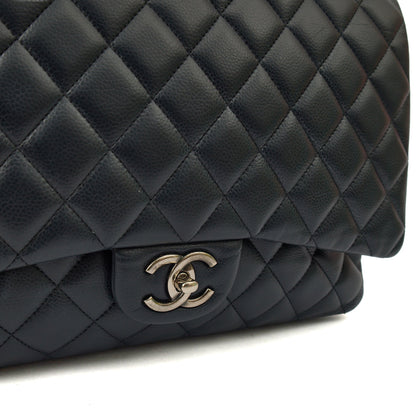 Chanel Shoulder Bag Classic - Maxi in Navy, Lambskin Leather — Lifestyle View