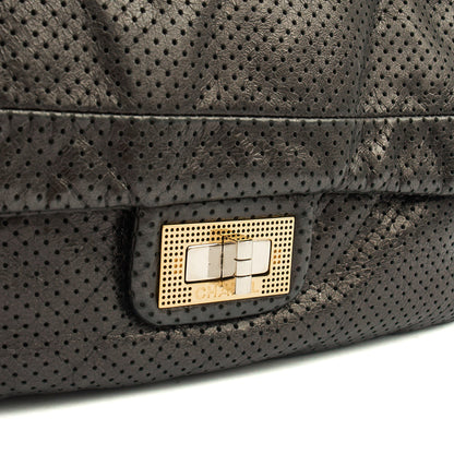 Chanel Shoulder Bag 2.55 Reissue in Black, Calfskin Leather — Lifestyle View