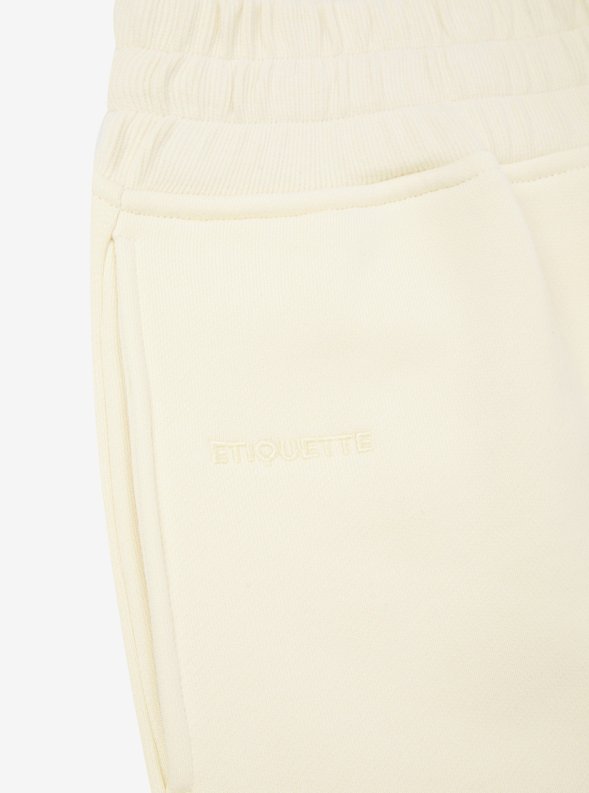 Etiquette Core Short 'Buttermilk' — Buttermilk — Size S — Top View