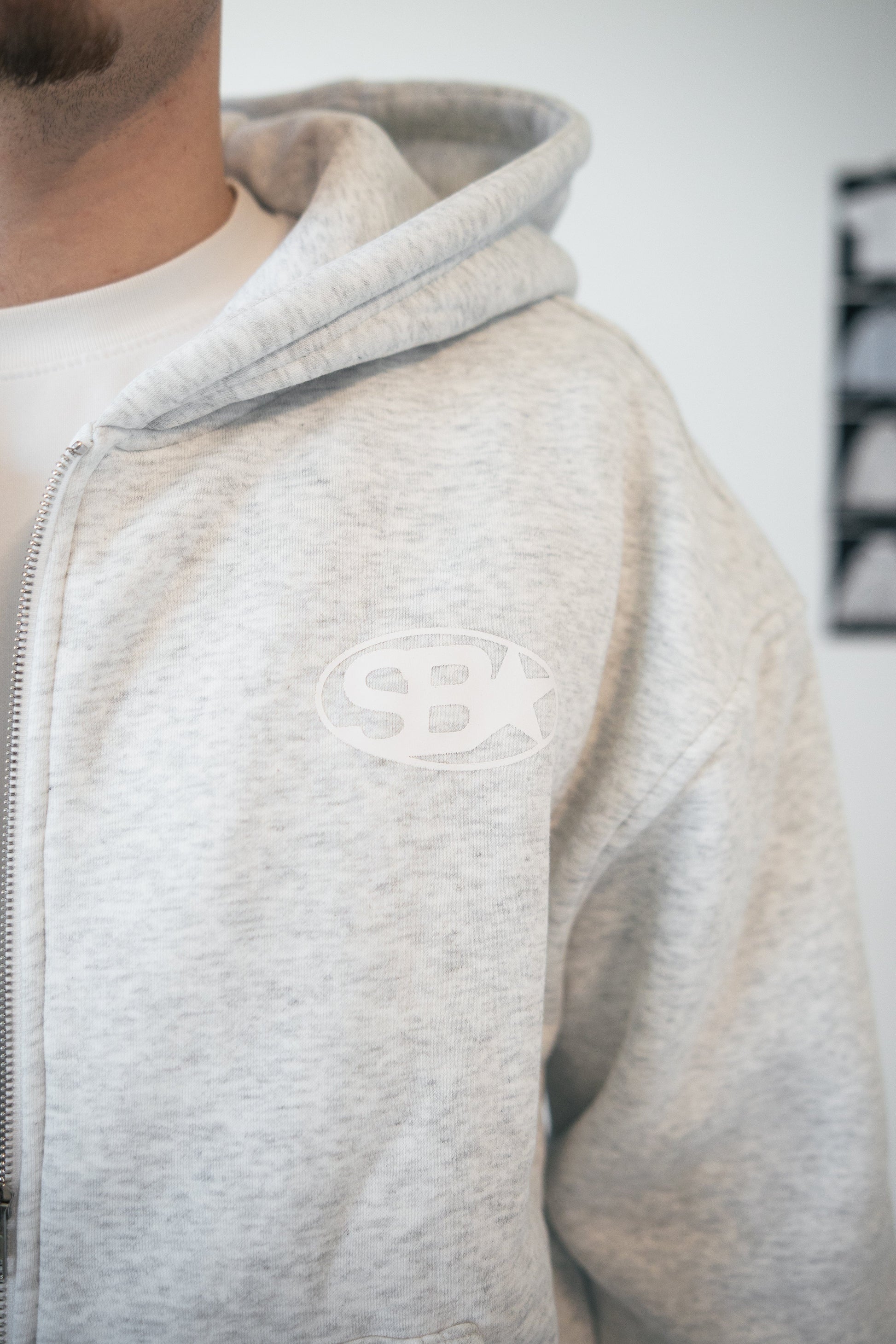 Star Emblem Zip Hoodie — S — Lifestyle View