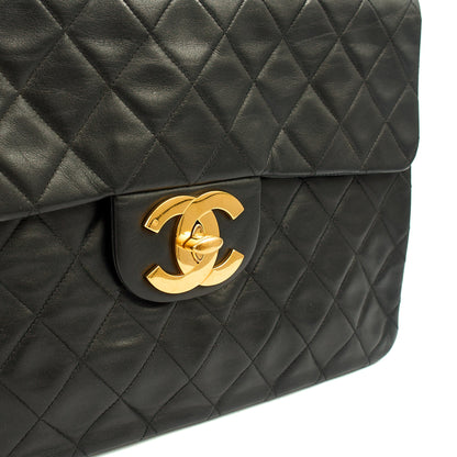 Chanel Shoulder Bag Maxi Jumbo XL in Black, Lambskin Leather — Lifestyle View