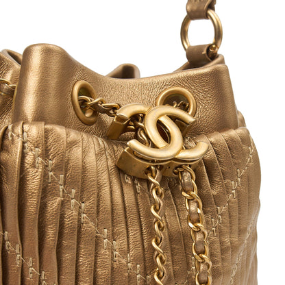Chanel Bucket Bag Paris Cosmopolite Drawstring Bucket Bag in Metallic, Calfskin Leather — Lifestyle View