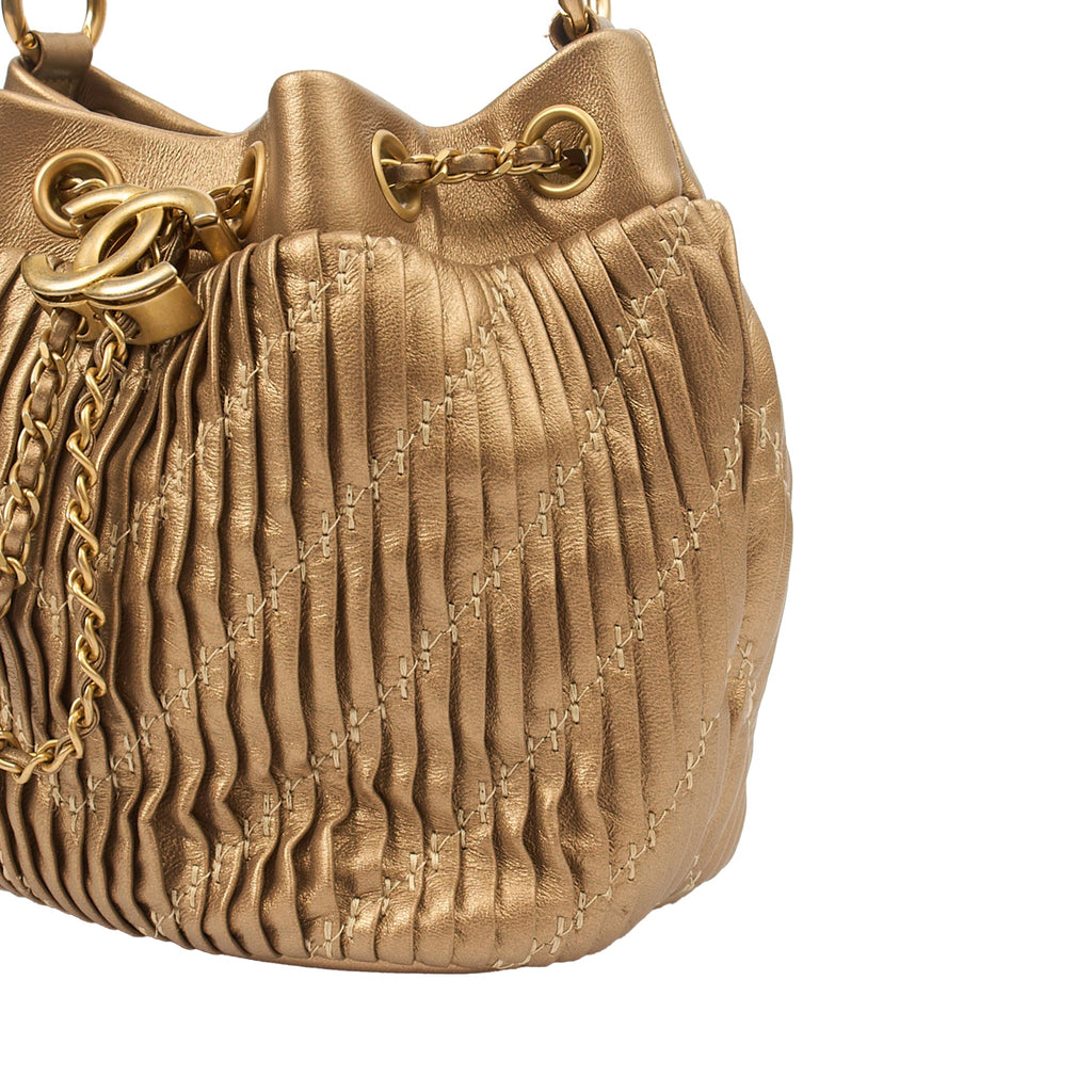 Chanel Bucket Bag Paris Cosmopolite Drawstring Bucket Bag in Metallic, Calfskin Leather — Detail View