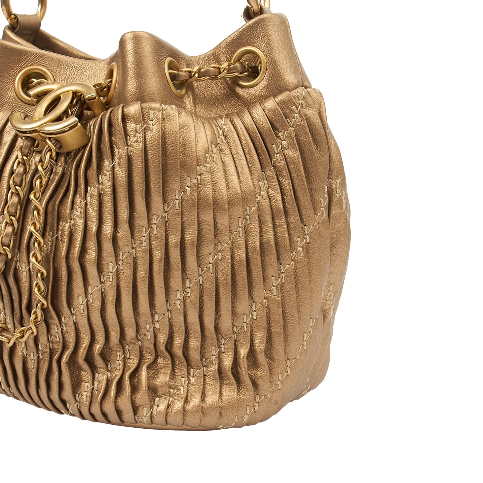 Chanel Bucket Bag Paris Cosmopolite Drawstring Bucket Bag in Metallic, Calfskin Leather — Detail View