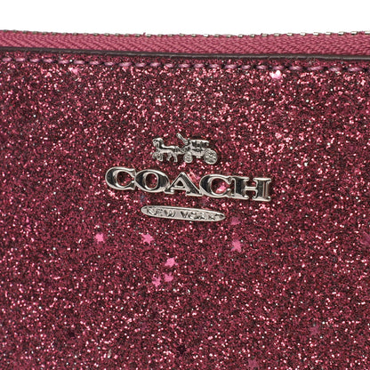 Coach Clutch Bow Wristlet in Purple, Leather — Lifestyle View