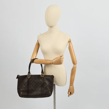 Gucci Tote Lovely Heart GG Interlocking Tote in Brown, Guccissima — Side View