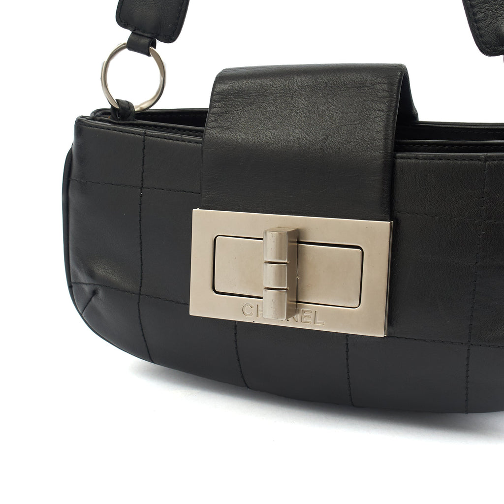 Chanel Shoulder Bag No.5 Giant Mademoiselle Bag in Black, Calfskin Leather — Lifestyle View