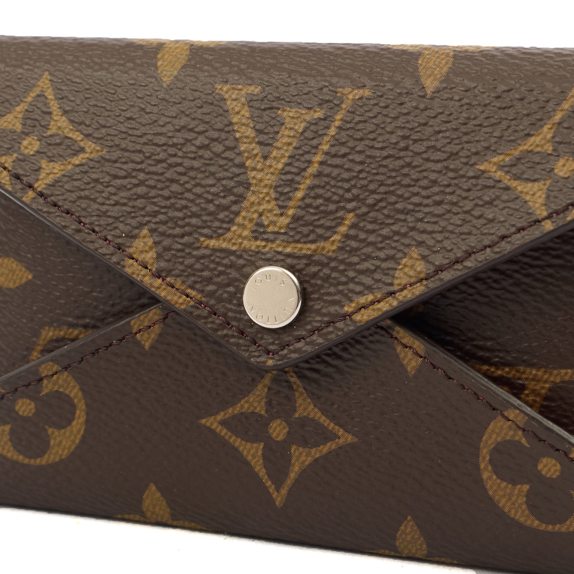 Louis Vuitton Pink Purse Kirigami Pochette in Monogram, Canvas — Lifestyle View
