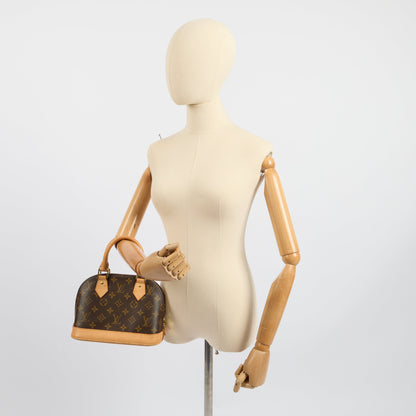 Louis Vuitton Cross Body Alma BB in Monogram, Canvas — Lifestyle View