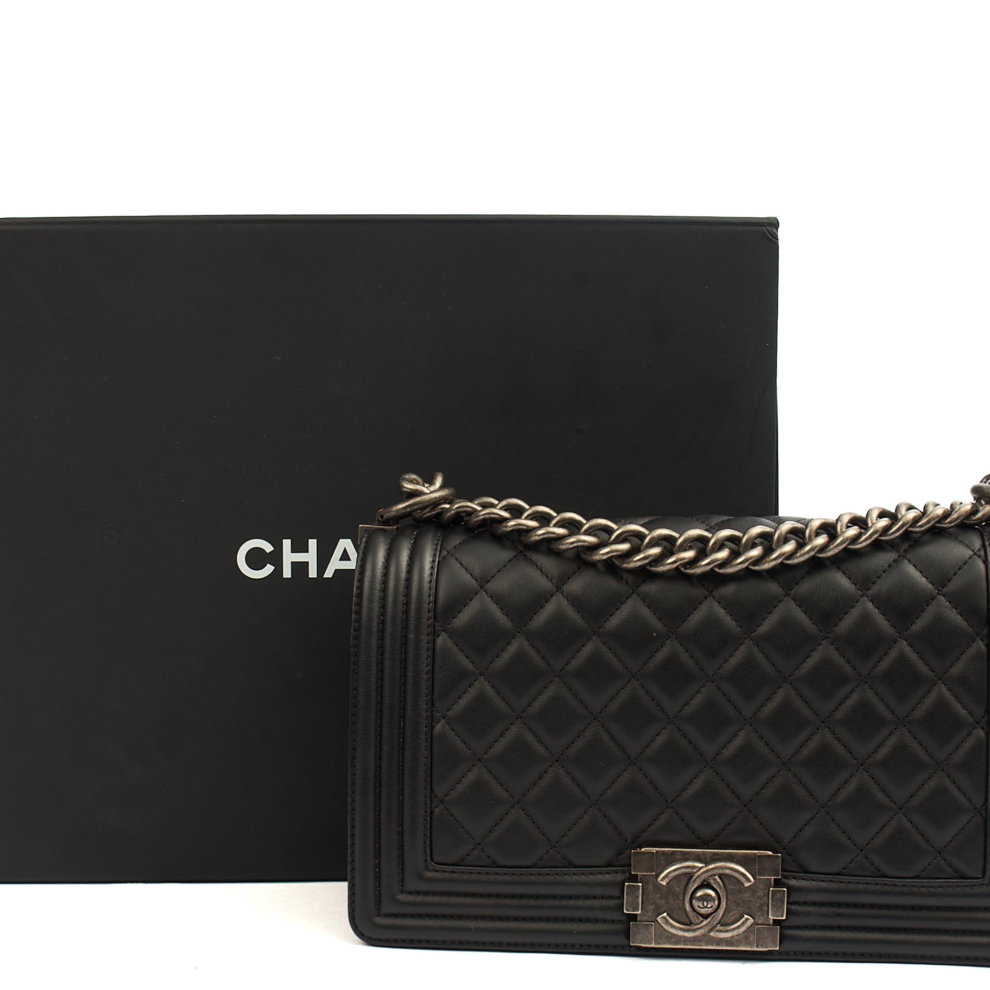 Chanel Cross Body Boy - Medium in Black, Calfskin Leather — Side View