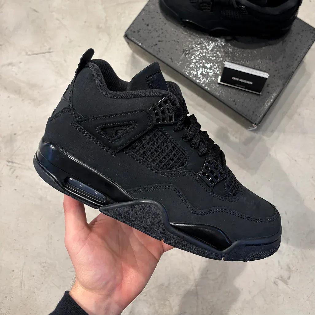 Jordan 4 Retro Black Cat 2025 — 3 UK — Lifestyle View