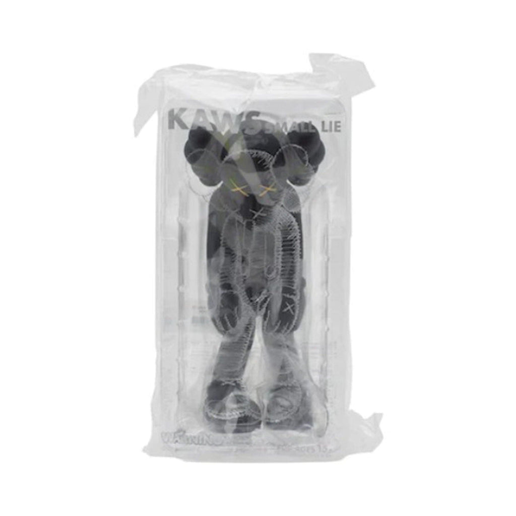 KAWS Small Lie Companion Vinyl Figure Black — Side View