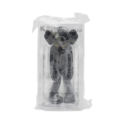 KAWS Small Lie Companion Vinyl Figure Black — Side View