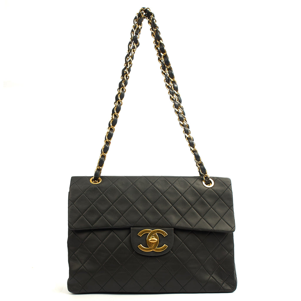Chanel Shoulder Bag Maxi Jumbo XL in Black, Lambskin Leather — Lifestyle View