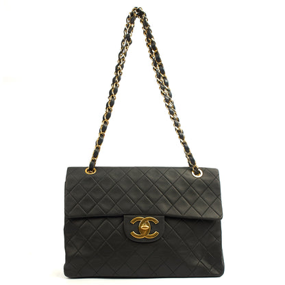Chanel Shoulder Bag Maxi Jumbo XL in Black, Lambskin Leather — Lifestyle View