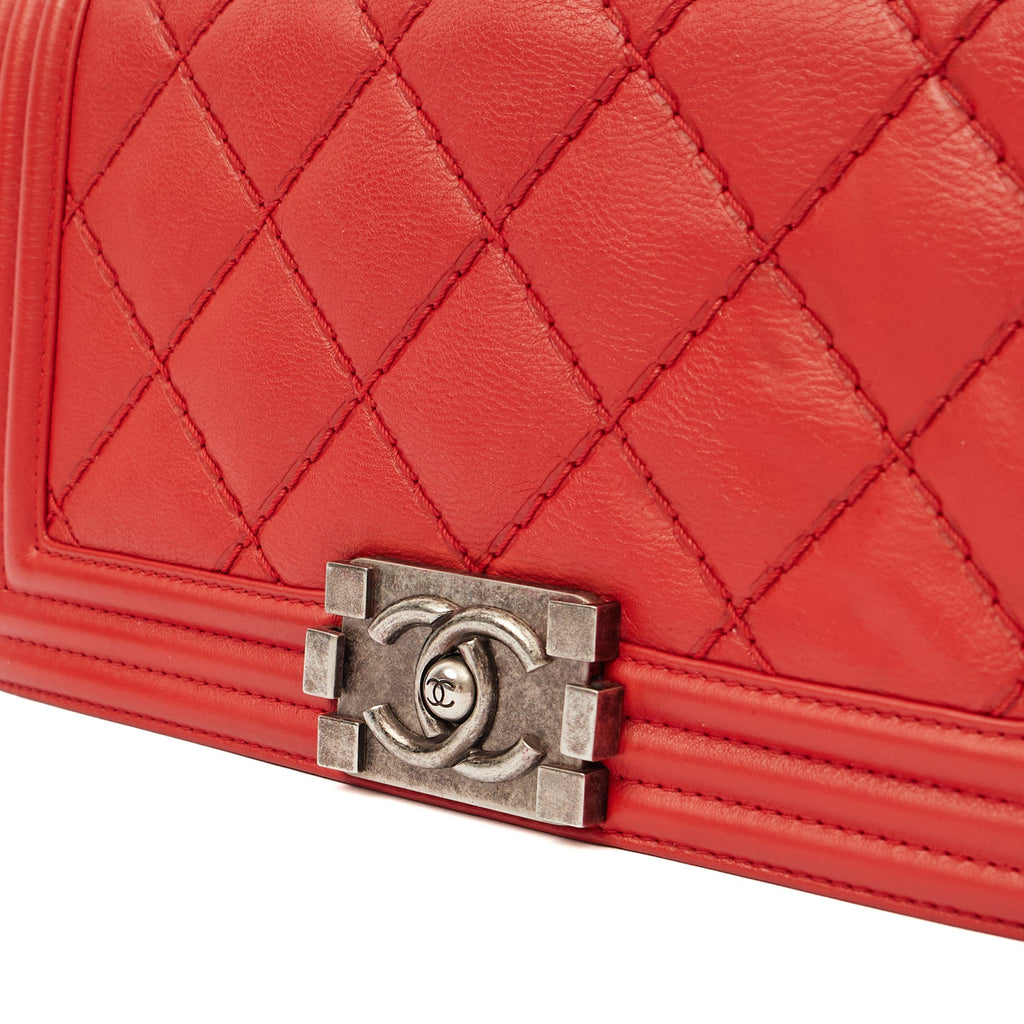 Chanel Shoulder Bag Boy - Medium in Red, Calfskin Leather — Lifestyle View