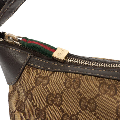 Gucci Mini Bag Pochette in Brown, GG Canvas — Lifestyle View