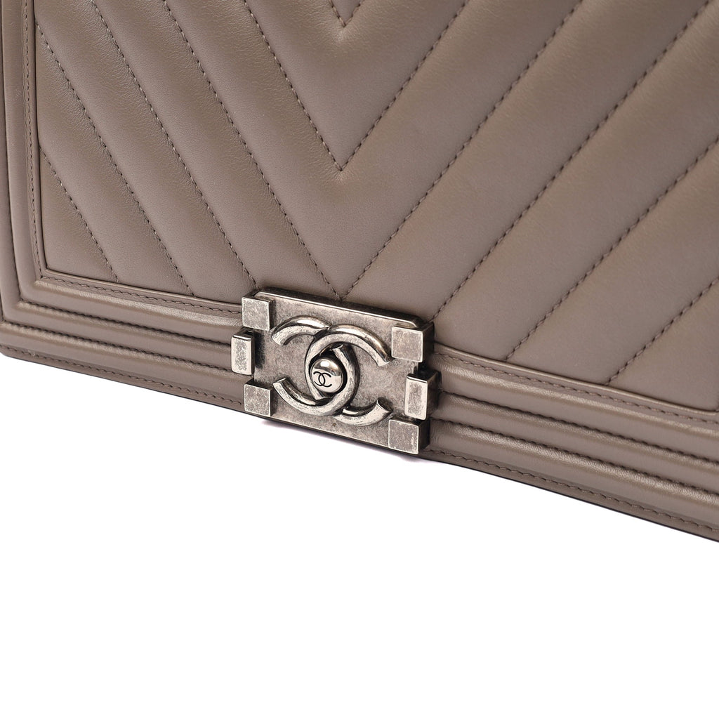 Chanel Shoulder Bag Boy - Medium in Grey, Calfskin Leather — Lifestyle View
