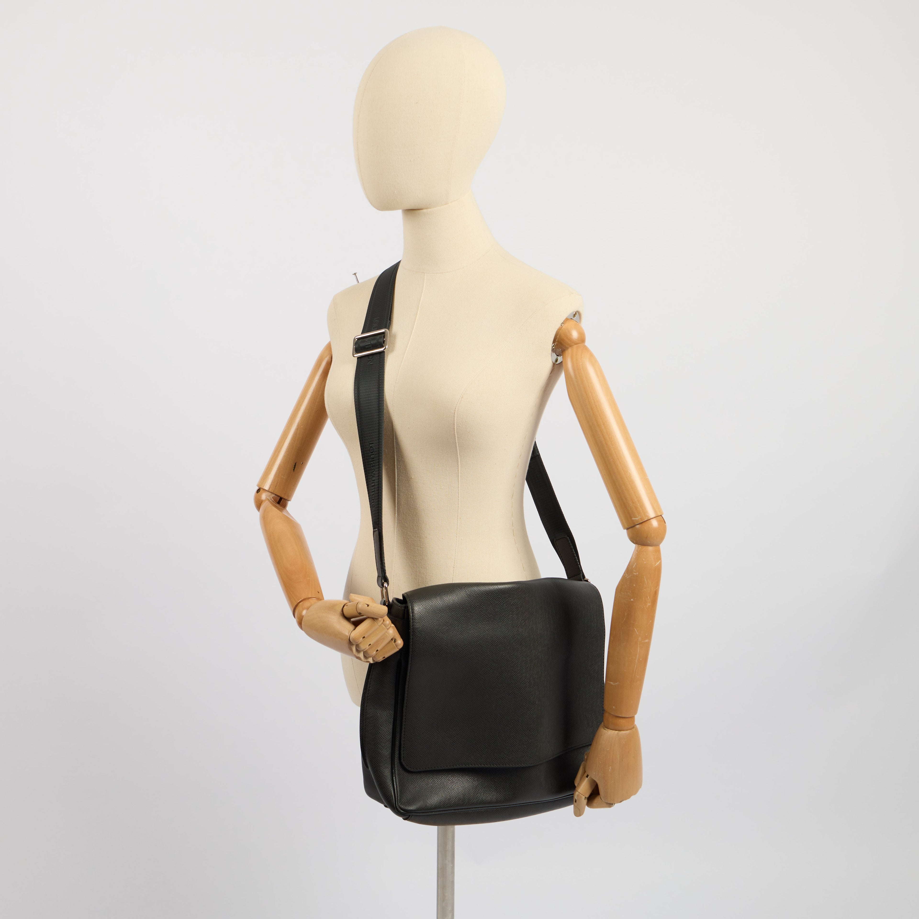 Louis Vuitton Cross Body District PM Messenger in Black, Calfskin Leather — Side View