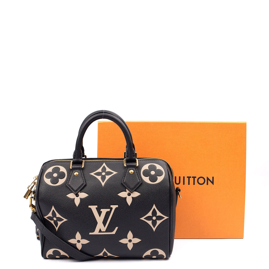 Louis Vuitton Top Handle Speedy Bandouliere 25 in Black, Empreinte Leather — Lifestyle View