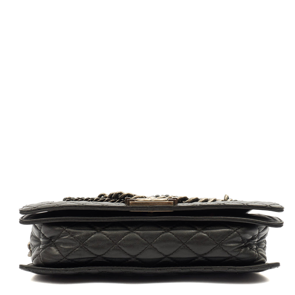 Chanel Shoulder Bag Boy - Medium in Black, Calfskin Leather — Lifestyle View