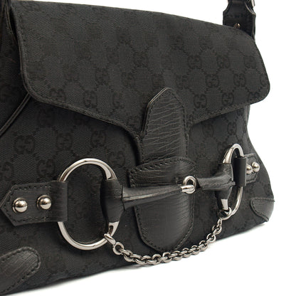 Gucci Shoulder Bag Horsebit Chain Shoulder Bag in Black, GG Canvas — Lifestyle View