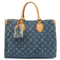 Louis Vuitton Tote On The Go MM in Denim, Leather — Front View