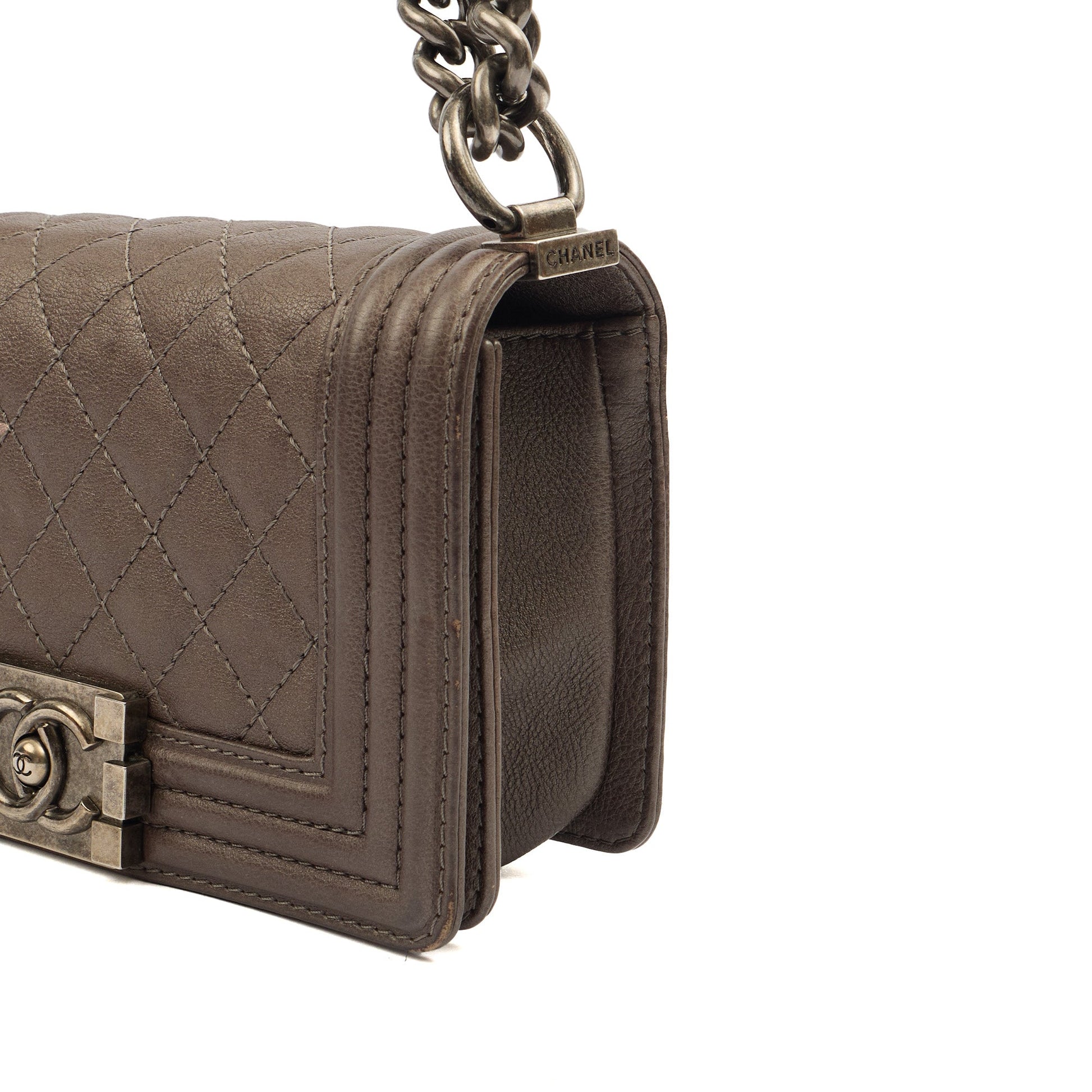 Chanel Shoulder Bag Boy - Mini in Metallic, Calfskin Leather — Lifestyle View