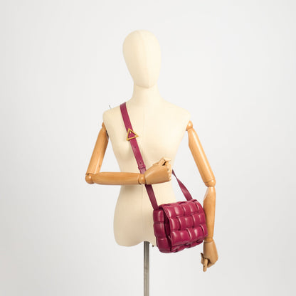 Bottega Veneta Cross Body Cassette in Raspberry, Intrecciato Nappa — Side View