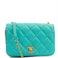 Chanel Cross Body Quilted Flap Bag Mini in Blue, Calfskin Leather — Front View