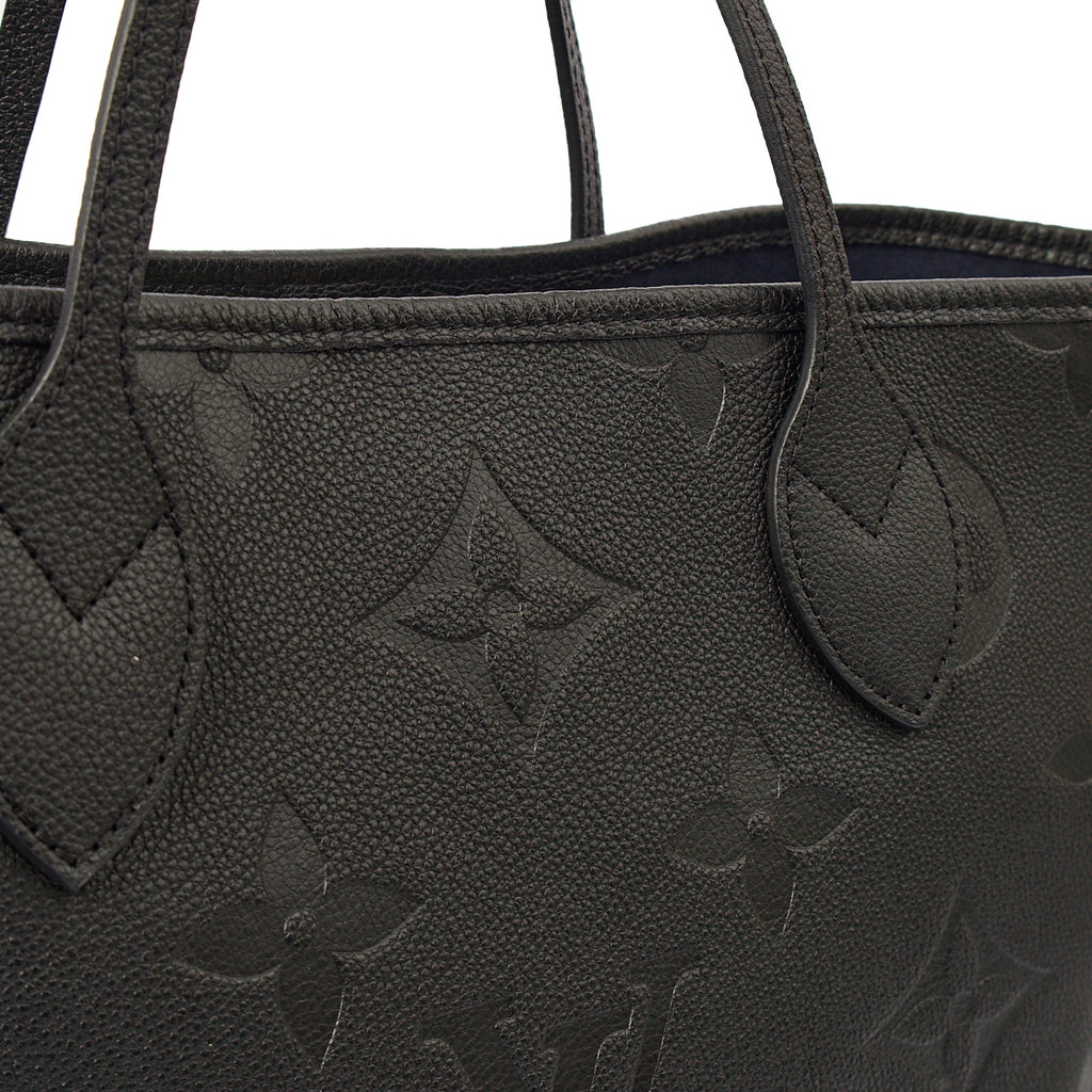 Louis Vuitton Tote Neverfull MM in Black, Empreinte Leather — Lifestyle View