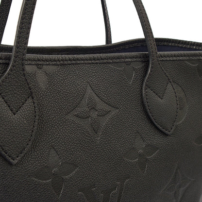 Louis Vuitton Tote Neverfull MM in Black, Empreinte Leather — Lifestyle View