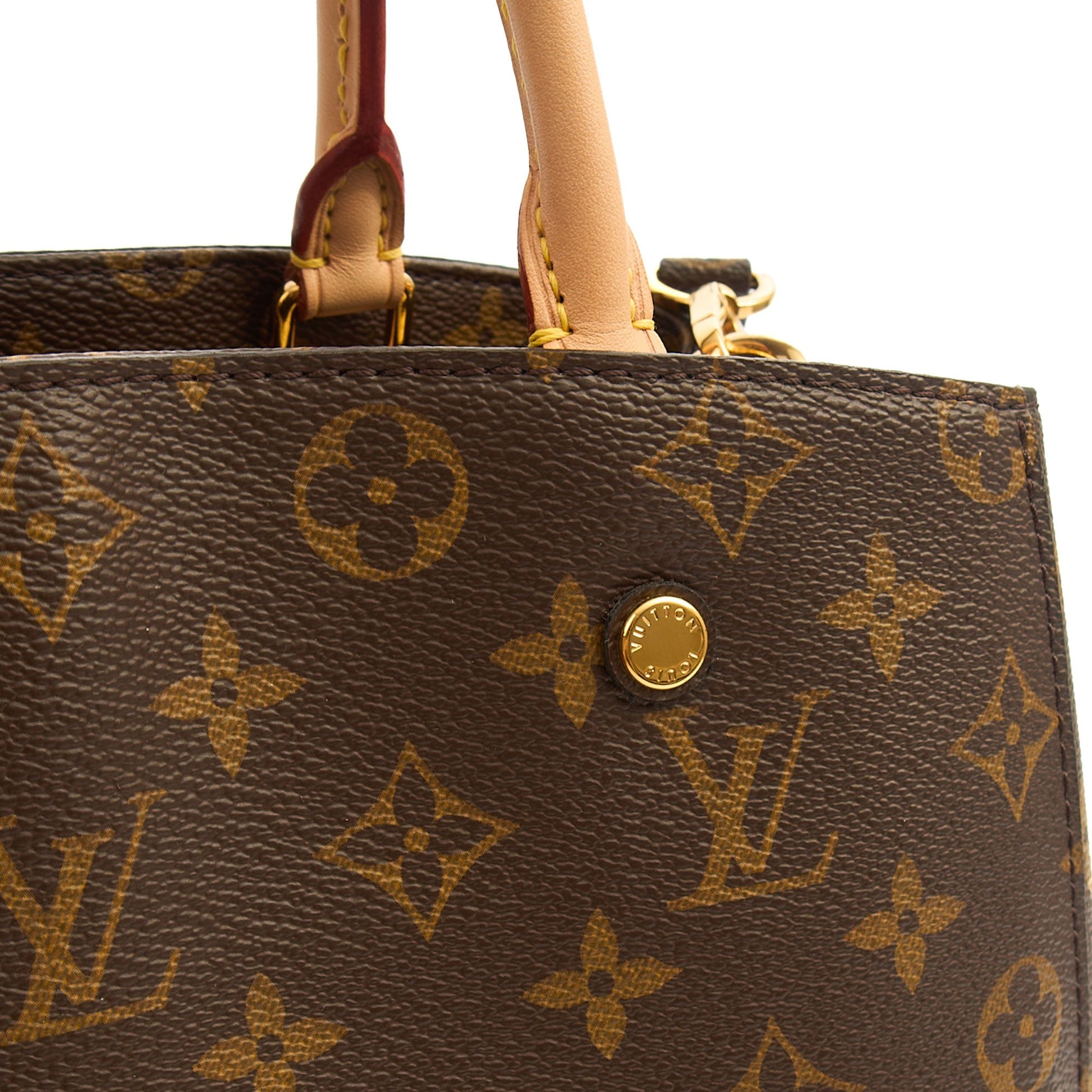 Louis Vuitton Top Handle Montaigne MM in Monogram, Empreinte Leather — Lifestyle View