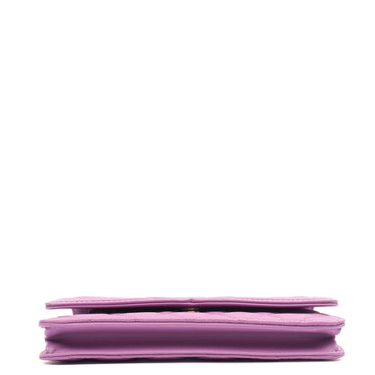 Chanel Cross Body CC Filigree Clutch With Chain in Purple, Caviar Leather — Lifestyle View