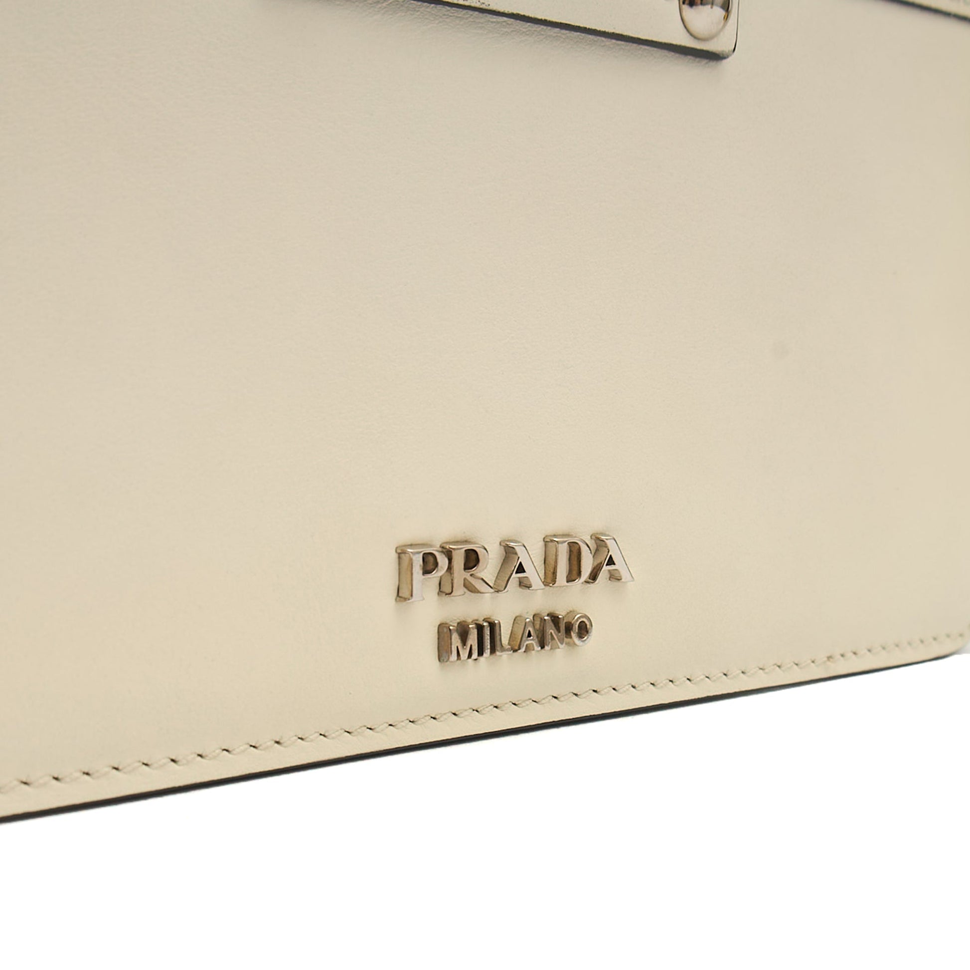 Prada Shoulder Bag City Calf Metal Ribbon in White, Leather — Detail View