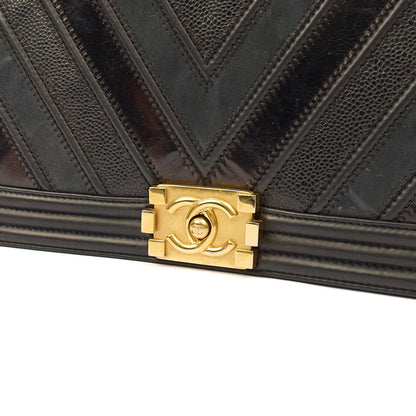 Chanel Shoulder Bag Boy - Medium in Black, Calfskin Leather — Lifestyle View