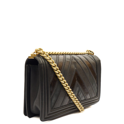 Chanel Shoulder Bag Boy - Medium in Black, Calfskin Leather — Side View