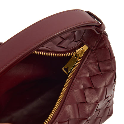 Bottega Veneta Top Handle Bauletto in Red, Intrecciato Nappa — Lifestyle View