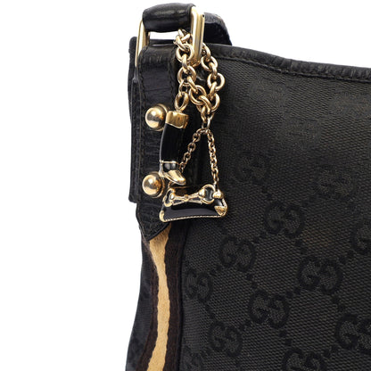 Gucci Cross Body Messenger in Black, Canvas — Lifestyle View