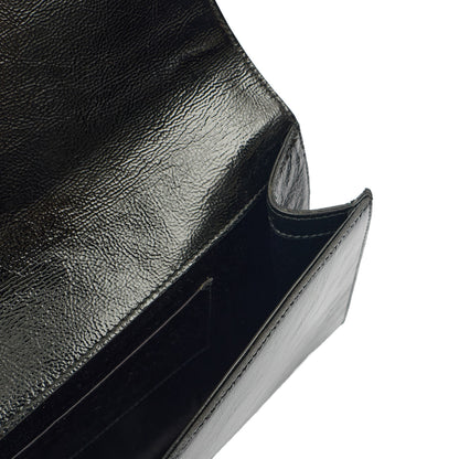 Saint Laurent Clutch Belle De Jour Clutch in Black, Calfskin Leather — Detail View