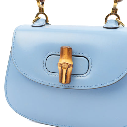 Gucci Top Handle Bamboo Top Handle in Blue, Patent Leather — Lifestyle View