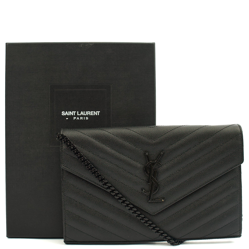 Saint Laurent Cross Body Envelope Chain Wallet in Black, Leather — Lifestyle View