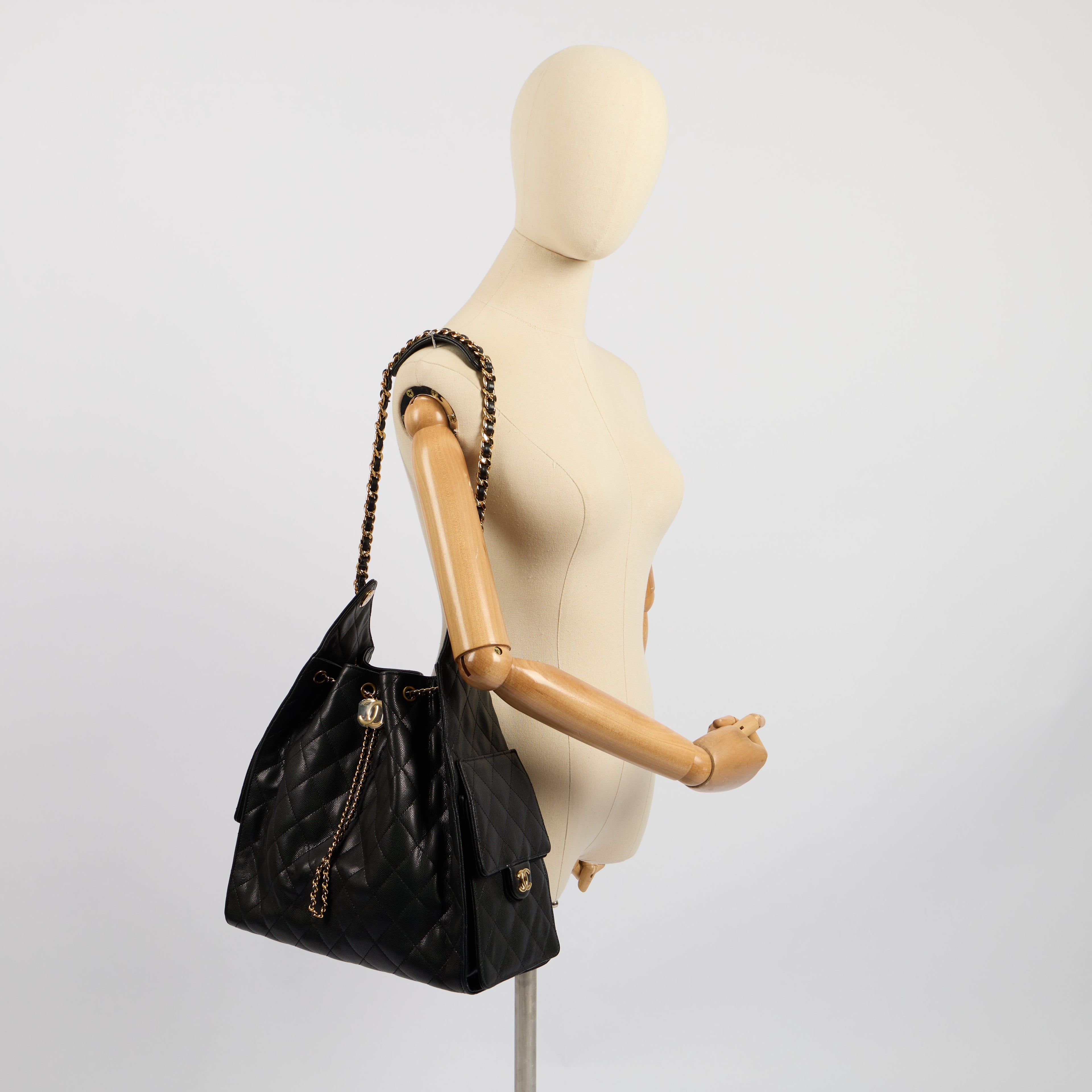 Chanel 25 - Medium in Black, Caviar Leather — Side View