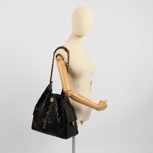 Chanel 25 - Medium in Black, Caviar Leather — Side View