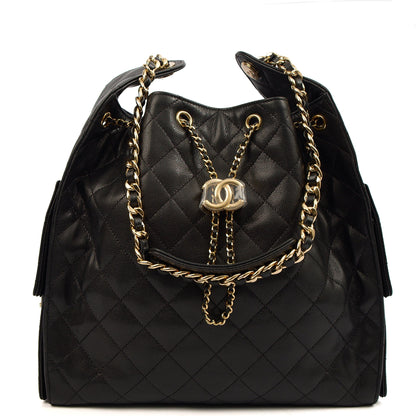 Chanel 25 - Medium in Black, Caviar Leather — Lifestyle View
