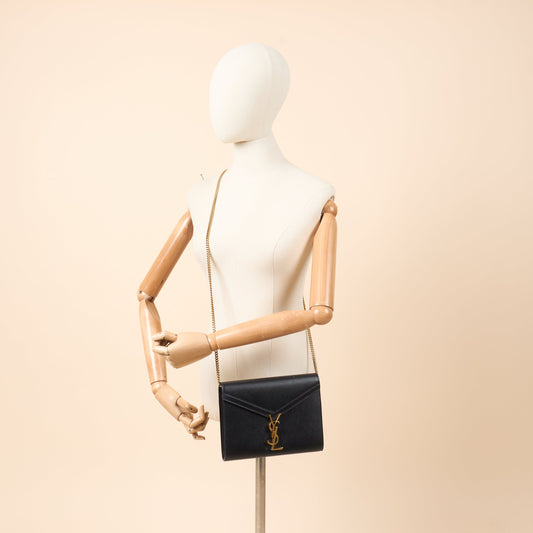 Saint Laurent Cross Body Cassandre Chain Flap Bag in Black, Calfskin Leather — Side View