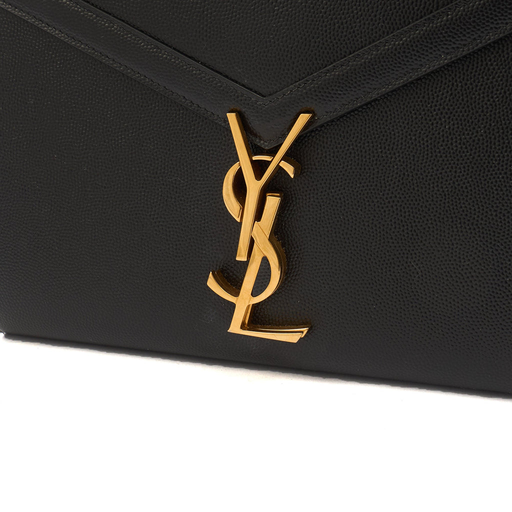 Saint Laurent Cross Body Cassandre Chain Flap Bag in Black, Calfskin Leather — Lifestyle View