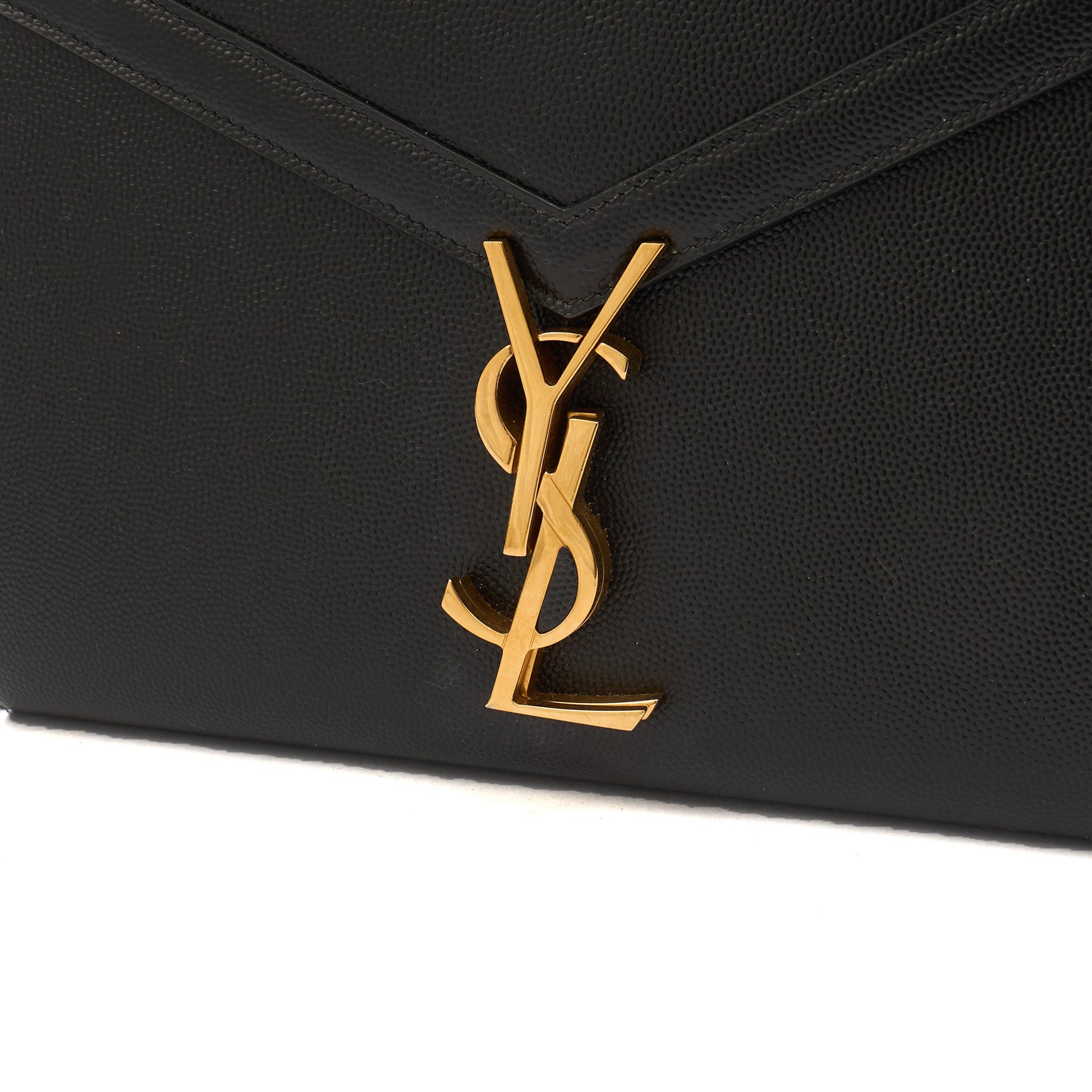 Saint Laurent Cross Body Cassandre Chain Flap Bag in Black, Calfskin Leather — Lifestyle View