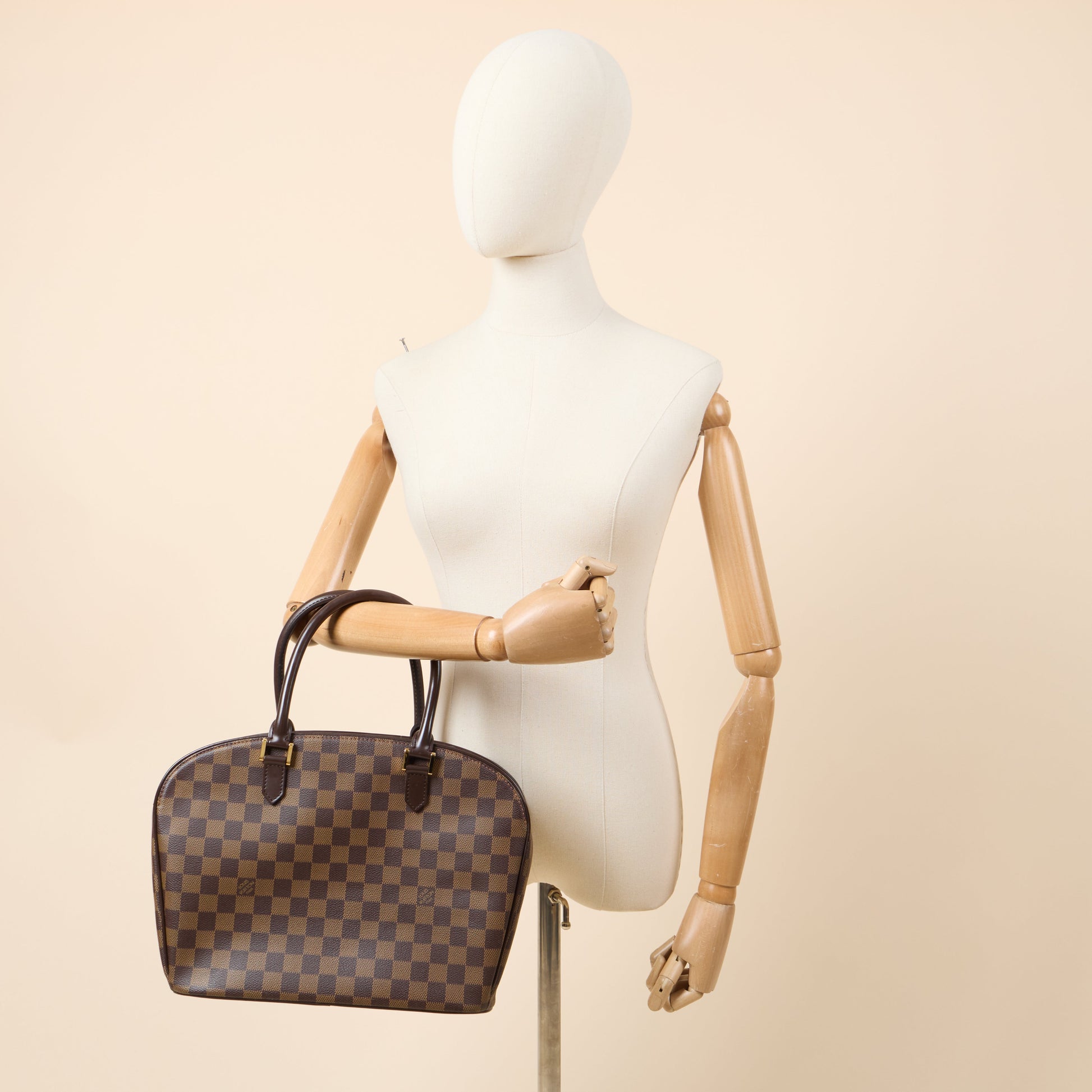 Louis Vuitton Top Handle Saria in Damier Ebene, Canvas — Side View