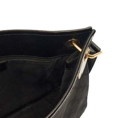 Gucci Cross Body Vintage Shoulder Bag in Black, GG Canvas — Lifestyle View
